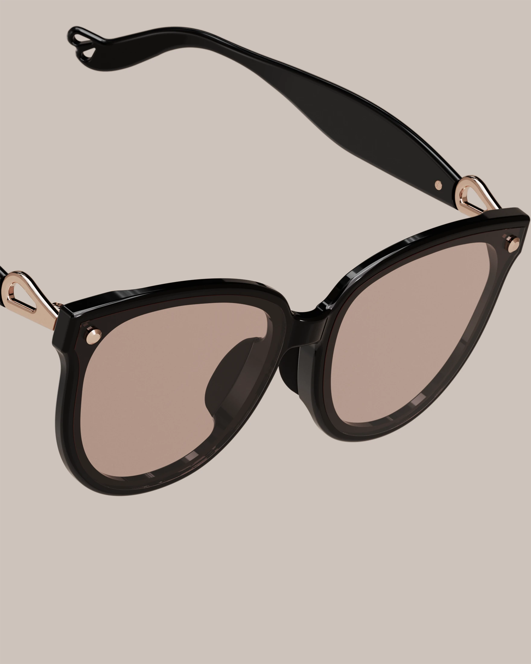 Sweet Pain NANA C1 sunglasses close-up showing edgeless rimless lens design in Citrus